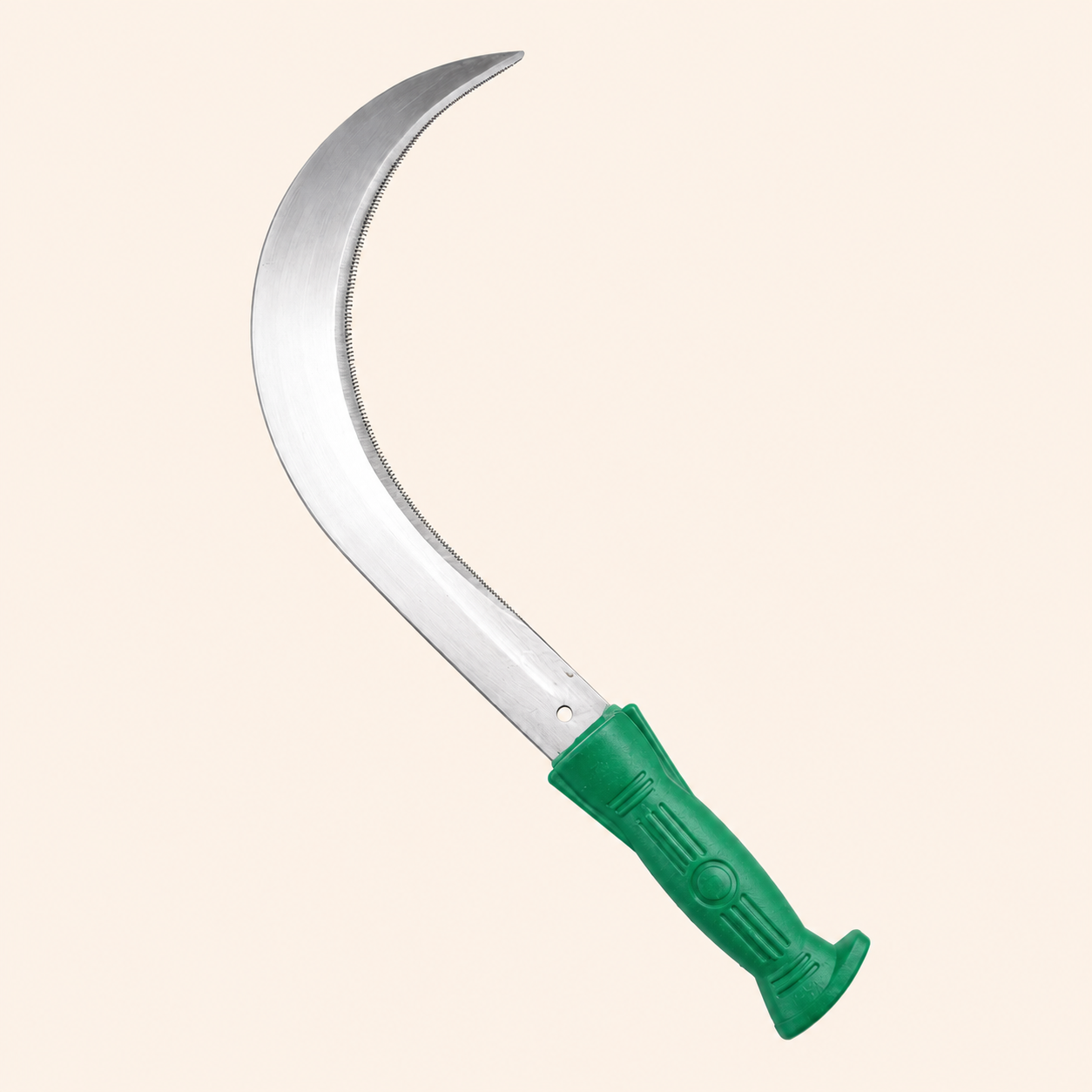 Sickle with green handle on a beige background
