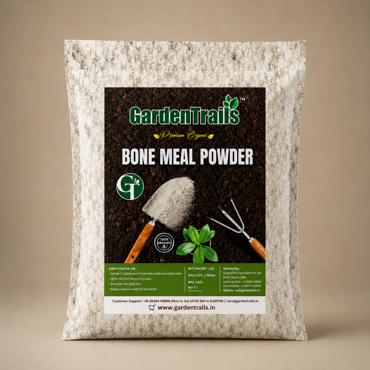 Package of Garden Trails Bone Meal Powder on a textured surface with a brown background